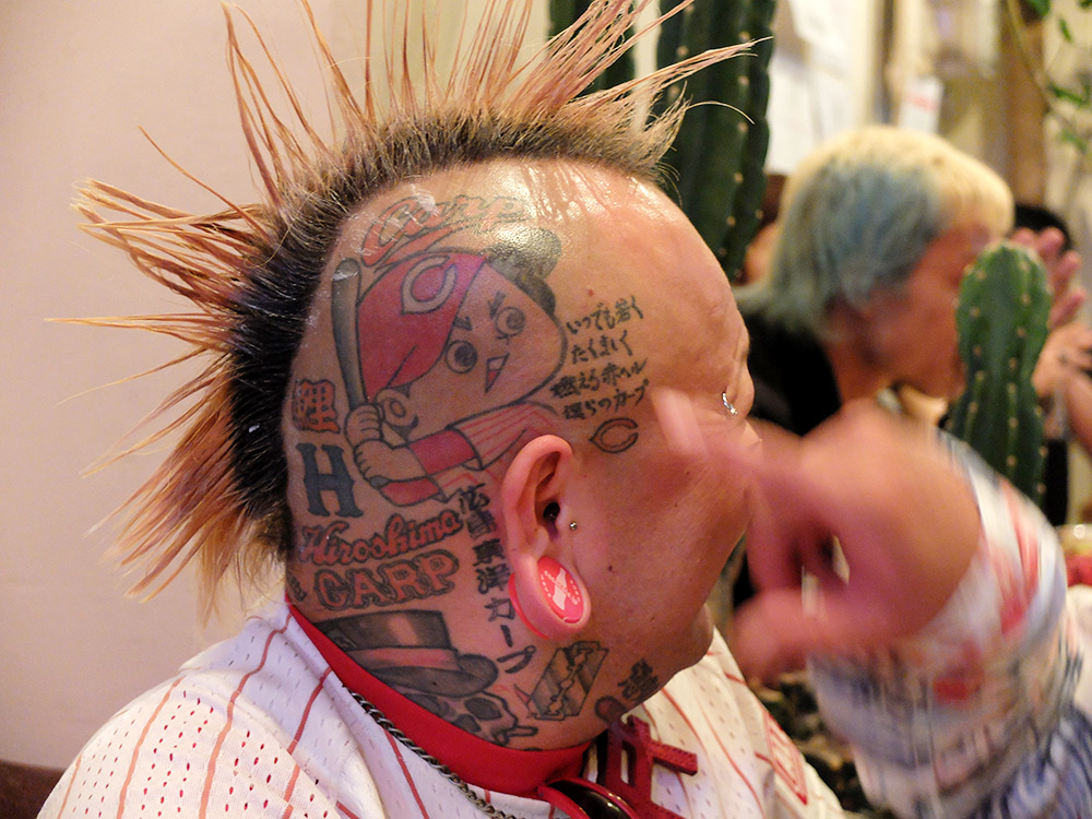 Carp-boya tatoué sur le crâne de Potty