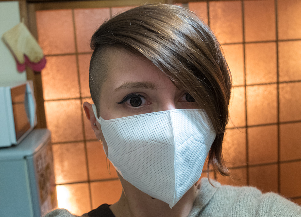 Jud à Hiroshima malade avec un masque